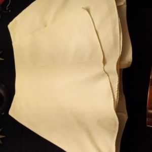 Beige Skirt barely touching the knees